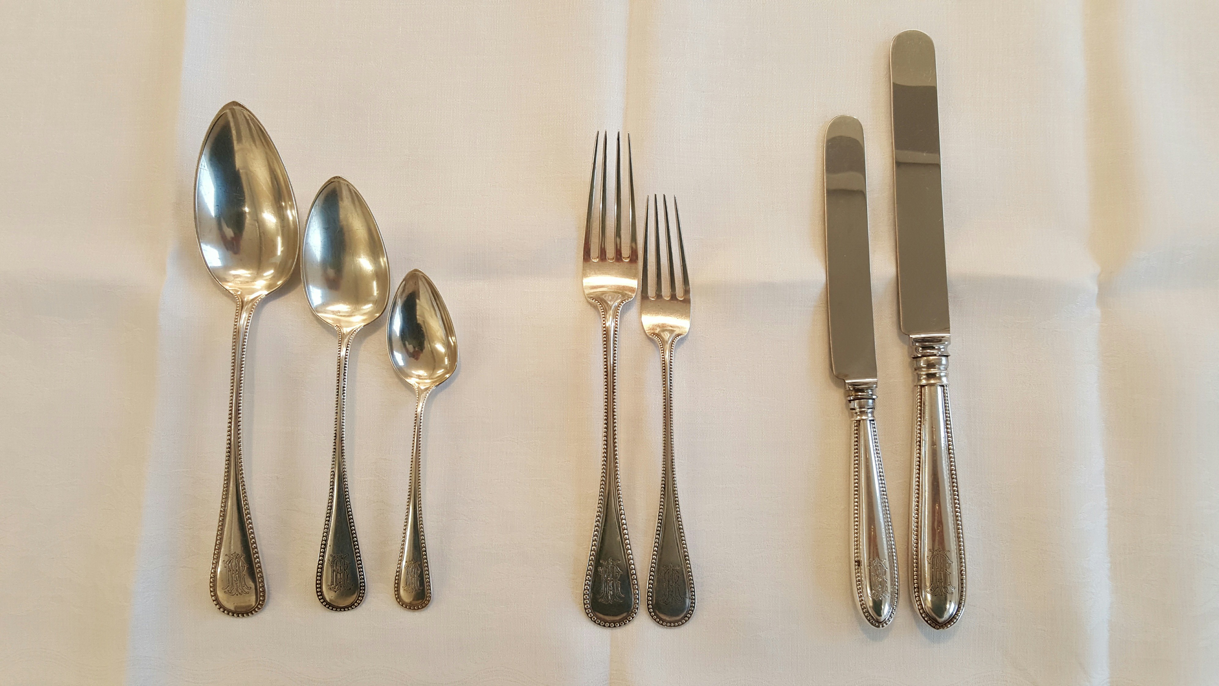 The silverware in use in 1901 was larger than the pieces we use today. the soup spoon on the left is ten inches long and feel huge.